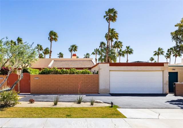 2740 N De Anza Rd. Palm Springs, California Income property potential, or your own cozy desert getaway. This fully fenced property offers privacy, updated amenities and just a few minutes from the Iconic Downtown Palm Springs. Pull up to the two-car garage and large paved driveway to enter your lush courtyard complete with tropical foliage. Inside the home you will find an open concept living room with a chic fireplace that flows into the dining area and kitchen. Accent beams can be found on the ceiling and the entire space is kept airy and bright from the large floor to ceiling windows with privacy shutters that are found on both sides of the room. Kitchen has been fully equipped with stainless steel appliances, granite countertops, ample cabinet space and pantry closet. Primary bedroom suite features a sliding door leading to a private outdoor oasis, as well as a walk-in closet with built-in shelving, and upgraded modern bathroom with large shower with glass door enclosure. Secondary bedroom & bath also feature modern aesthetics, large windows, and easy private access from the secondary bedroom to the secondary bathroom. Outside you will find access to the amenities pool area as well as a personal spa and soaking pool with built-in deck within your own property lines, and secured garbage bin area. Located just a quick drive or bike ride to Downtown Palm Springs that hosts a variety of unique dining, entertainment, and shopping experiences.