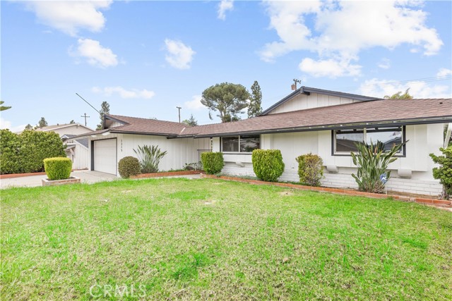 Welcome to your future home in the beautiful city of Brea! This craftsman design style home, with an amazing curb appeal, features 3 generously sized bedrooms and 2 bathrooms with a dual vanity sink in the master bedroom. As you enter this home, through a custom-built wooden front door, you are welcomed into a warm inviting setting that is lit by an abundance of natural sunlight from large ample windows during the day and soft comforting recess lighting for the evening with your family and guests. The high ceilings and spacious living room are perfect for your entire family to enjoy. The kitchen has brand new stainless steel appliances, an undermount porcelain sink, a breakfast bar, a marble countertop, and floating cabinetry. This home also features an additional backroom that could be used for a sitting area, nursery, playroom, etc.