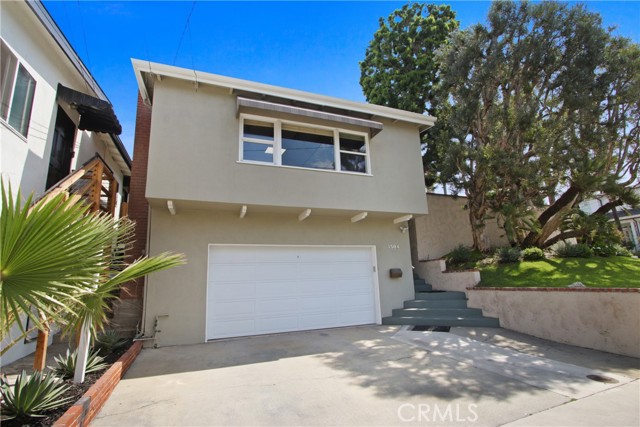 Nice sized 2 car garage and double parking in front