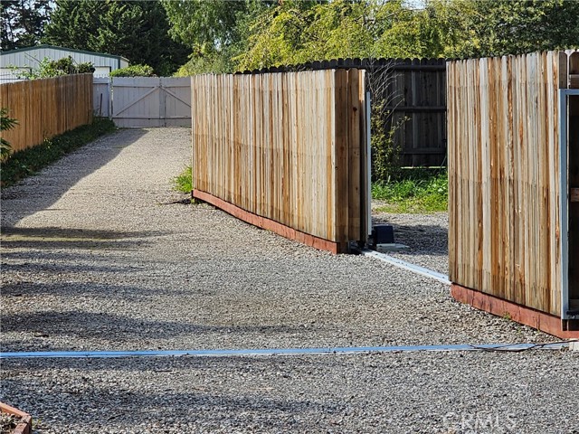 double gate entry to rear of property from driveway