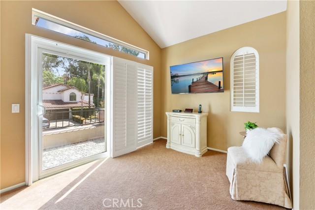 Perfect space in the primary suite to set a sitting area, desk, workout item, or whatever you dream to use as you wish. Double pane slider to beautiful patio with custom tile.