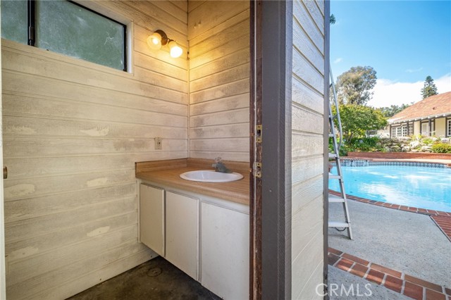 There is even a handy 1/2 bath by the pool -- you know:  "we don't swim in your toilet, so please don't . . . "