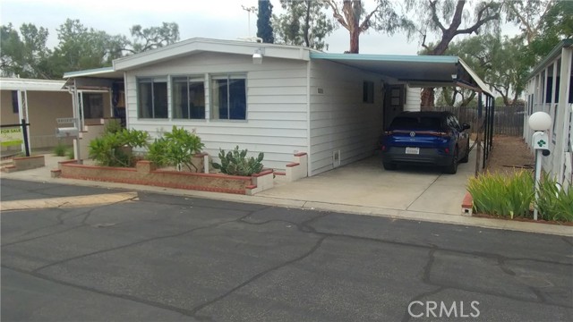 CARPORT FULL LENGTH OF COACH