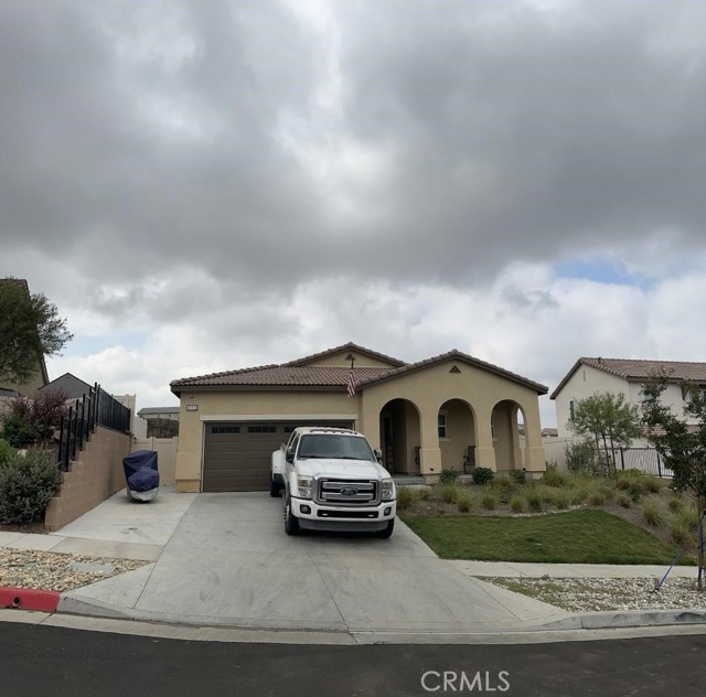 Bring your buyers to see this house in the highly sought after gated JP Ranch community.  The home is perfect for family, close to schools and shopping.  With a great view and 4 bdrms with plenty of room for kids and guests. The roomy master bedroom has a large walk in closet.  This home also has all the SMART HOME features. You will love the open concept with a large size great room that opens to the kitchen with laminate floors and granite counters  The low maintenance backyard has a view with no neighbors behind.  Has a great community pool and a gorgeous clubhouse .  Bring your decorating ideas and make this home yours!!