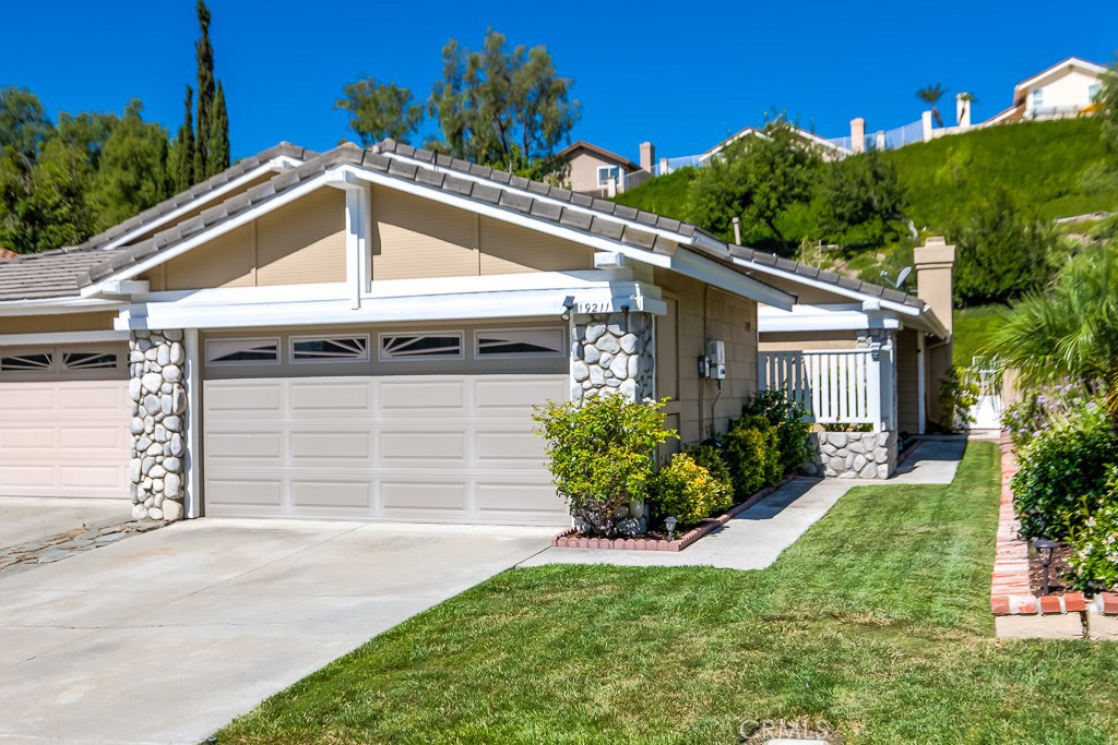 Absolutely gorgeous and desirable single story home! Too cute for words but here we go! Open concept bright and airy home with beautiful dual pane windows and french doors, high vaulted ceilings, extensive rich wood flooring, upgraded kitchen with quartz counters and stainless appliances, remodeled master bath with granite counters, custom baseboards and window coverings, light custom neutral paint throughout, custom upgraded light fixtures and recessed lighting, private outdoor master bedroom retreat, Solar System (leased) saves lots of $$$, peek a boo mountain views out front, awesome large private resort style beautiful backyard, etc. etc....but wait there is more! Great mid tract location near all HOA amenities, No mello roos and super low HOA dues!  I'm telling you....you better act fast!!!!!!