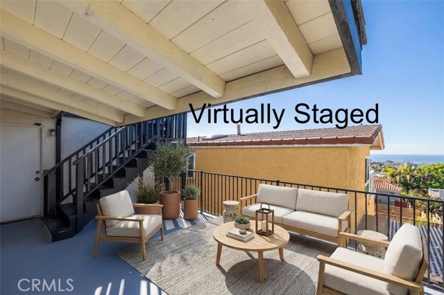 Virtually Staged Ocean View Balcony from Primary Bedroom