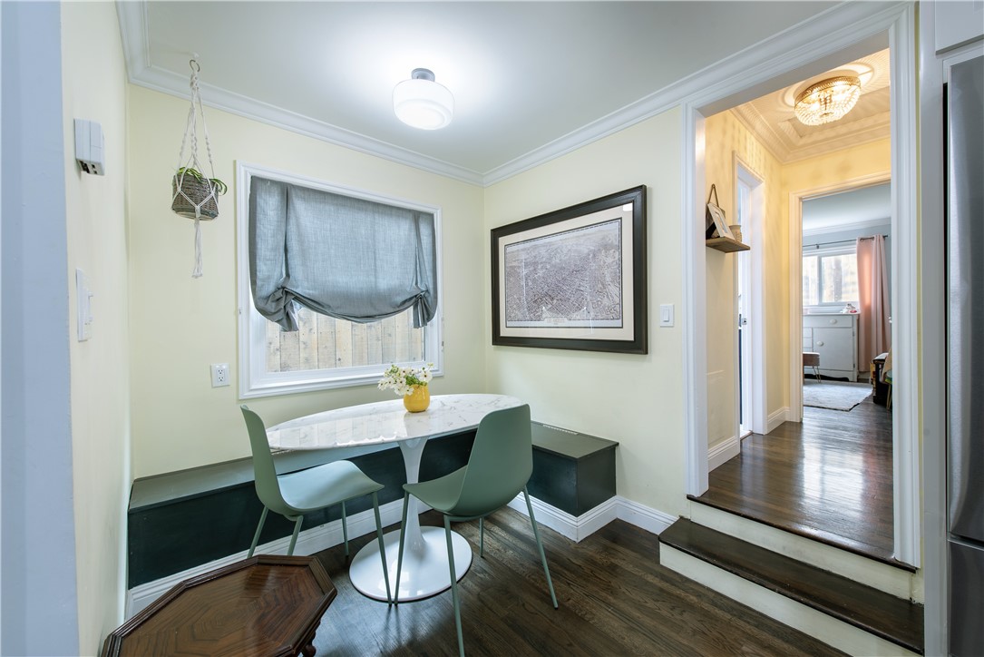 Dining room with efficient built in seating sits just off of the dining room