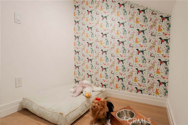 This special home even has a charming alcove for pets!