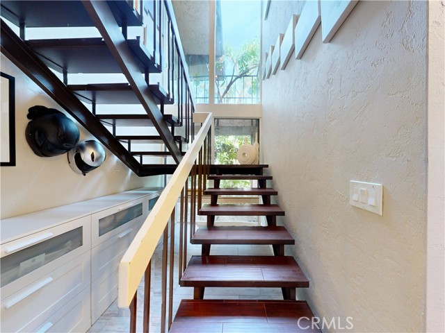 Open Stairs- bring the outside in with window to the yard