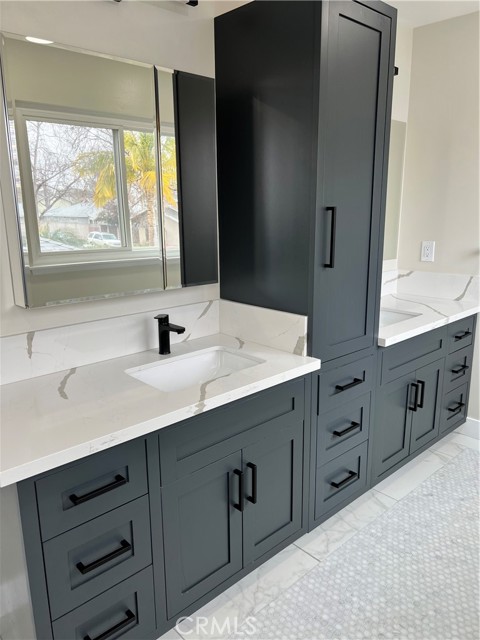 Custom double vanity with dual mirrored medicine cabinets