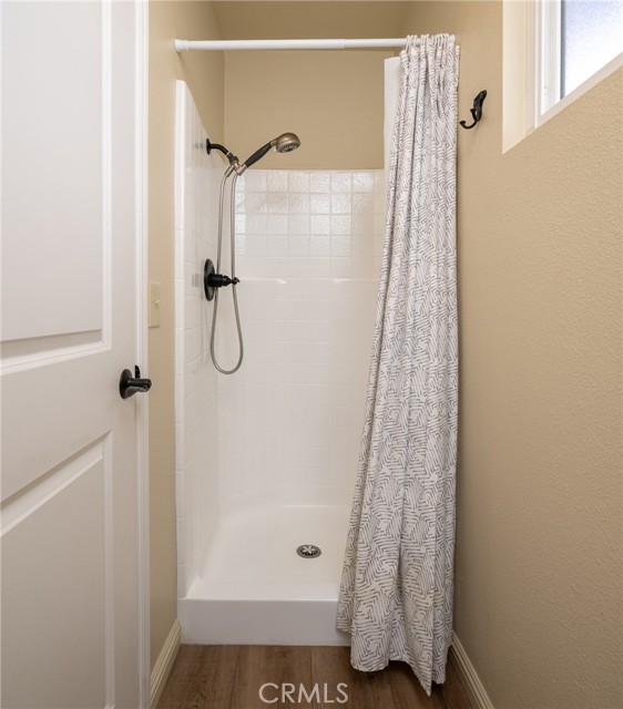 There is a separate shower and commode area in the ensuite.