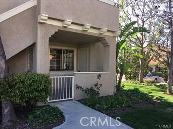 Updated in 2017 and only has had one occupant until now! Great opportunity to live in the heart of Rancho Santa Margarita. VinylFlooring, quartz countertops, new tub, toilet, vanity, newly painted, overhead lighting added in bedrooms, new ceiling fan, new faucets, dishwasher and stove less than 5 years old. It has AC - recently installed theromstat, and full size stackable washer and dryer installed!!  This is a darling cozy one story with a large covered patio area.  One carport space and one parking space. Right kitty-corner to the pool and spa area - close to lake RSM - just about .3 of a mile on a peaceful paseo to the lake with stores and restaurants right on the lake.  Short distance to all amenities - shops, stores, movies, recreation and parks right at your fingertips!! Live in the center of Rancho Santa Margarita!! A lifestyle all it's own!