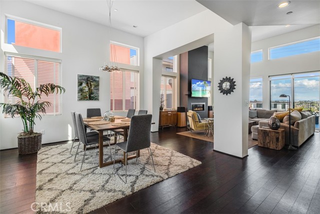 Soaring high ceilings in the Dining room and the Family room with city and mountain views to the East.