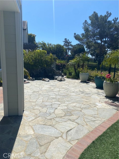 Patio with awning and view of the golf course