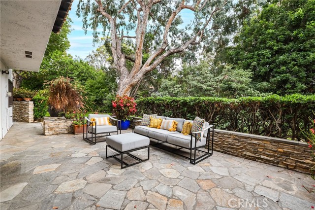 Wrap-around back patio, offering a side view of the Back Bay.