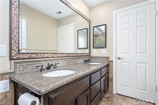 Full sized remodeled bathroom with dual vanity