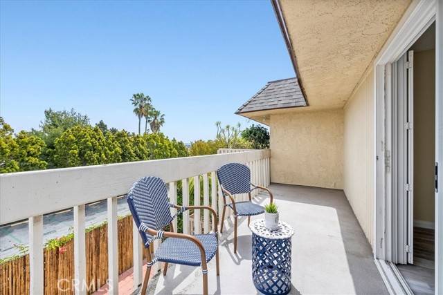 Primary balcony with views of downtown, mountains and city