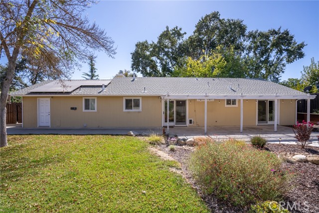 Notice the built in pet doors next to the sliding glass door in the dining area and next to the garage door.