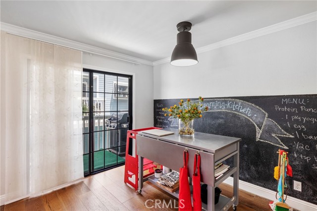 Kitchen dining nook with balcony.