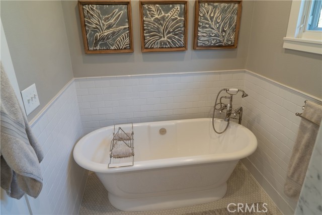 High end freestanding tub in primary suite.