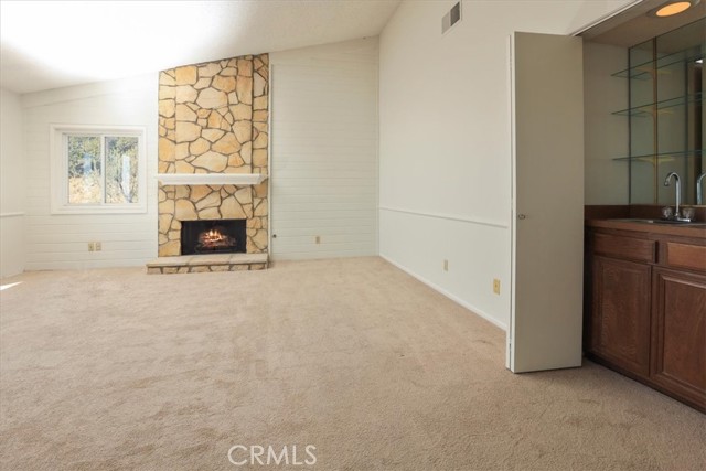 Stone fireplace in Living Room