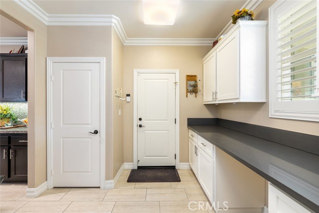 Downstairs Laundry Room Adjacent to 
Kitchen