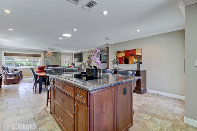 Living Room & Dining Area with Recessed Lighting & Solar Tube