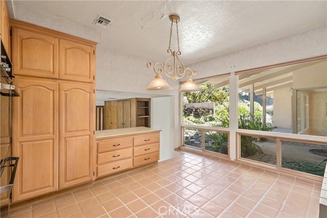 Kitchen looks to front porch