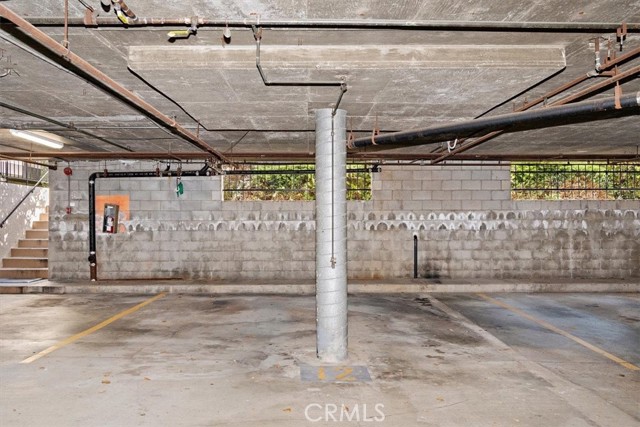 2 side by side subterranean parking spots
