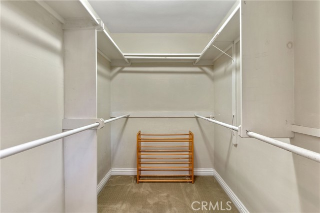 Primary Bedroom's Walk-in Closet.