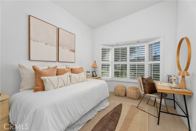 2nd bedroom with attached bath and walk-in closet.
