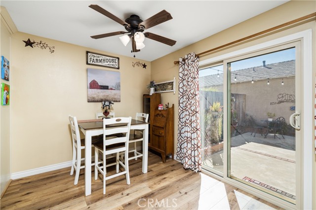 Breakfast nook through slider to backyard.