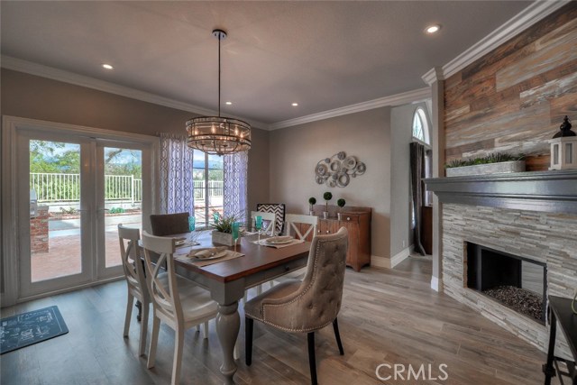 Lovely view of the dining room with french doors directly to the extra large back yard.