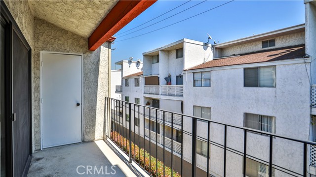 Balcony with a large storage closet.
