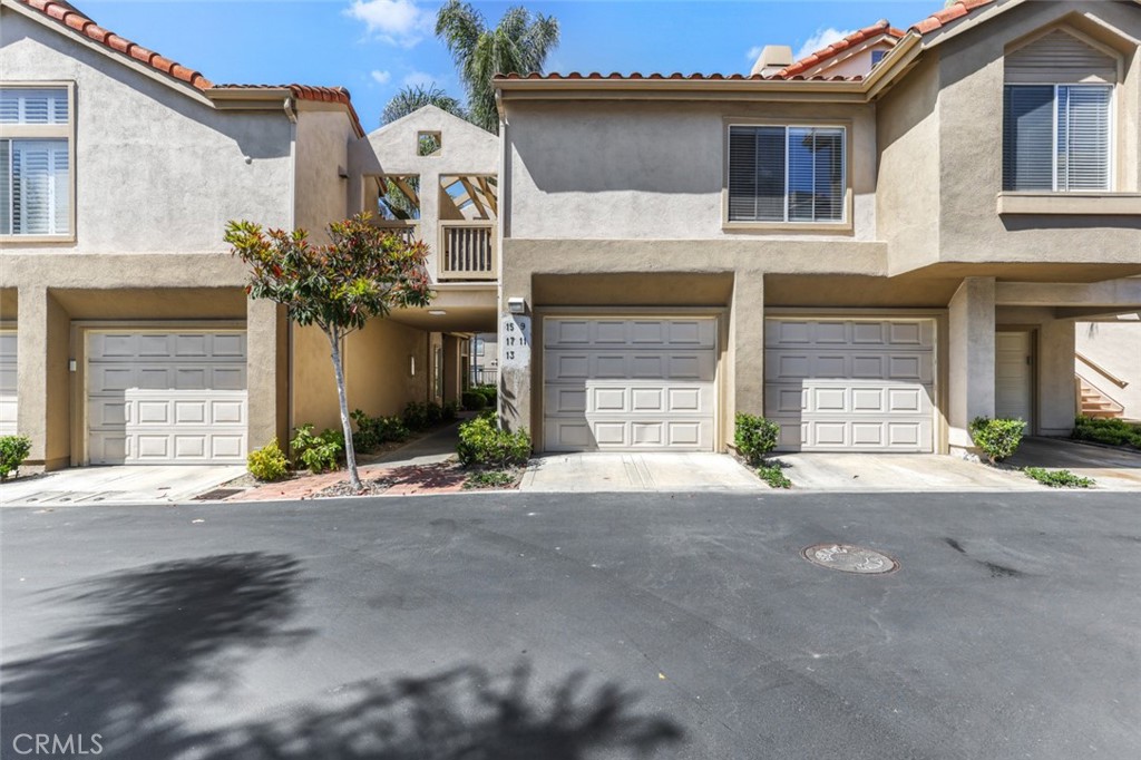 Stunning 2-Bed, 2-Bath Condo in Laguna Niguel’s Desirable Palm Court Community! Welcome to resort-style living in the heart of Laguna Niguel! This beautifully maintained 2-bedroom, 2-bathroom condo is nestled in the highly sought-after Palm Court community, known for its serene surroundings and top-tier amenities. Step inside to discover an open and airy floor plan featuring a light-filled living area with vaulted ceilings, a cozy fireplace, and sliding doors that open to a private balcony—perfect for enjoying Southern California’s coastal breezes. The kitchen offers a functional layout with ample storage and bar seating, ideal for casual dining or entertaining. The primary bedroom offers a large en-suite bathroom. The secondary guest bedroom is sun-filled and features a large closet. There is also in unit laundry and an oversized 1 car garage. Enjoy the resort-style community amenities, including a stunning pool and spa. With nearby hiking trails, world-class beaches, shopping, dining, and top-rated schools, this location truly has it all.