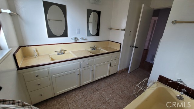 Main bathroom, featuring double sinks.