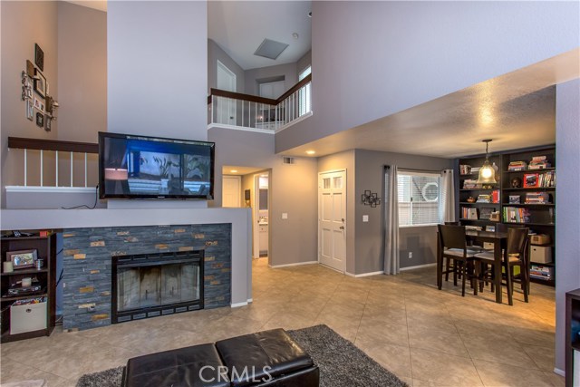 Beautiful gas fireplace adds a most romantic touch to this great room.