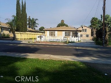 774 N Orange Street Riverside, California This beautiful multifamily 7 bedroom triplex home overlooks the community park that contains a swimming pool and nearby golf course. The house includes 3 bedrooms 1 bath and a carport with RV parking. 2 Apartments in the rear of this triplex include a laundry space. The front house has a separate parking for 4 more vehicles with a beautiful entrance.
Buyer to verify square feet and permits. Property sold as-is.