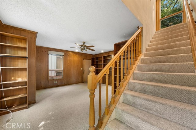 Living Room with the stairs going up to a bedroom