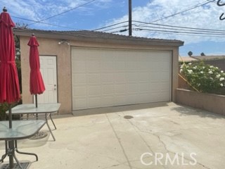 Long driveway with a 2 car private garage