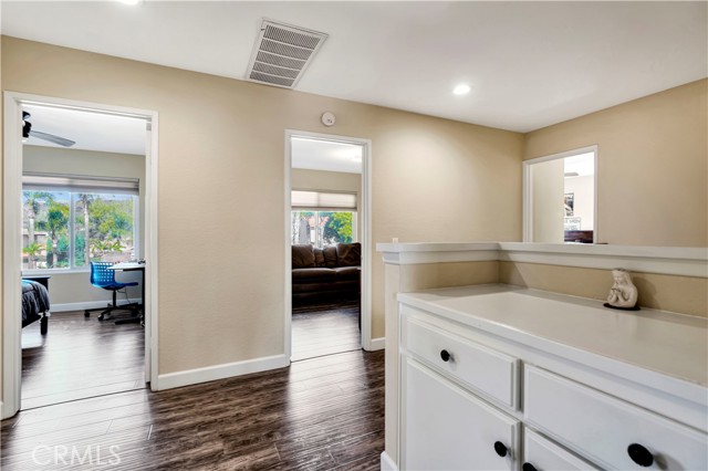 Stairway landing with built-in storage.