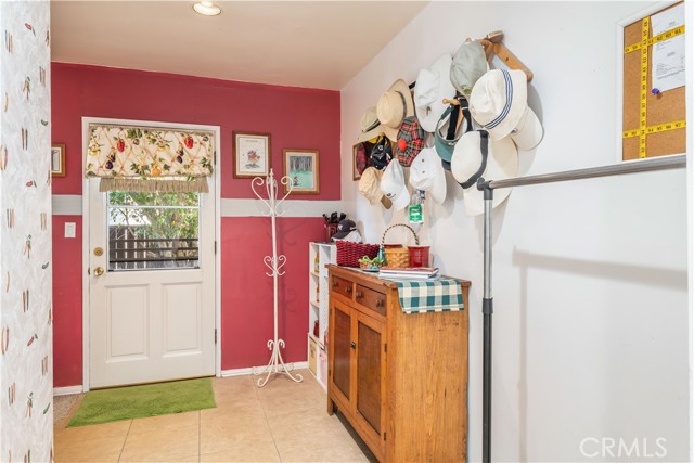 Laundry room off kitchen with garage access