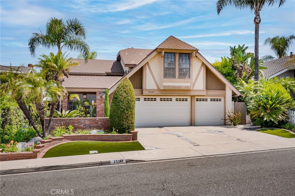 This Exquisite Home has 4 BR, 2.5 Baths Plus a Bonus or 5th BR & 3 Car Garage. Home was REPIPED with PEX last year! Enter into charming Gated Courtyard with Lush Landscaping, Swing, Pavers & Fountain to Leaded Glass Front Door. This House has it All!   2553 Sqft of totally Remodeled Beauty! Gorgeous Kitchen has Granite Counters with Tumbled Marble Backsplash, amazing Custom Soft Close Cabinetry & Drawers, Lazy Susans, Pull-outs  & More! High-end Stainless Steel Appliances: Counter Depth Refrigerator, 5 Burner Cooktop, Oven, Convection MW, Dishwasher & Hood. Huge Pantry & Waterstone Fixtures, Crown Molding, Recessed & Under Cabinet Lights. Entire Main Floor has lovely Porcelain Tile Floors. Formal DR and Family Room with Fireplace overlook tranquil & completely Private Rear Yard which is like an Oasis!. Lush Greenery, Built- In BBQ, Firepit, 3 Hole Putting Green, Fountain, Total Privacy & Flagstone Trimmed Patio & Spa! Main Floor Master has Fireplace, huge Walk-In Cedar Organized Closet, & a Stunning, Spacious Upgraded Master Bath. Upstairs 3 more big BRs and Giant Bonus Room. Move-in Ready with newer High-End Heat & A/C, Dual Paned Windows & Sliders, Carpet, deep Baseboards, 6 Panel Doors, textured Ceilings & Recessed Lights.  All Baths Remodeled w/ Corian Counters. 3 Car Gar w/ Built-in Cabinets, Workbench, & overhead Storage. In the Neighborhood is a glorious Park with Play Equipment, a huge Grass area, Basketball & a trail behind it!  No Assoc Fee, Low 1.01% tax, and Great Schools!