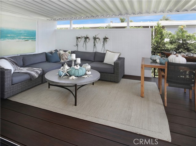 Oversized rear deck leading to abundant, private outdoor living space.