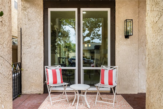 Front porch, new front windows and outdoor light fixture