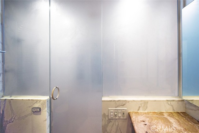 View of Japanese spa with Thermasol steam system activated; one of two Thermasol controls (lower left)