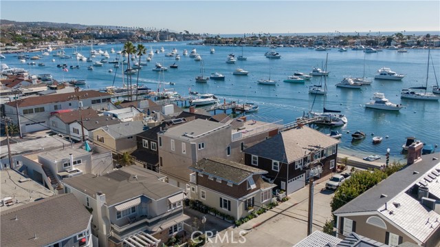 104 Onyx Newport Beach, California 104 Onyx is a Charming Beach Cottage and a Jewel on the South Bay of Balboa Island. This outstanding home has amazing views of the Newport Harbor. It has all the modern conveniences of a new home. Perfect for a 2nd house or an income property. It has been a Consistent Source of Income for the current owner. It’s located one block from the quaint little village on Marine Ave., with all the restaurants and specialty shops. An easy stroll will get you to the Ferry that can drop you off at the FUN ZONE on Balboa Peninsula. The home is a two story with 2 bedrooms and 2 full baths, and approximately 904 square feet. The new interior furnishings were Installed July 2018, and are being sold with the home. Features are: *Board and Batt paneling throughout *Charming Galley Kitchen with a farm house angled sink *Abundance of built in storage in both Bedrooms. *Custom closets with hampers *A beautiful Deck with a large dining table for 6 people & umbrella with BBQ. *Volume ceilings in the galley kitchen, dining and Master Bedroom from the original structure, built in 1927. *Coffer ceiling in the living room with wood beams and T&G paneling on the celling. *Storage Shed with beach toys/chairs. *Dutch doors at the back of the galley kitchen and upstairs MST Bedroom. *Stacked washer / dryer on landing off the galley kitchen. The location is spectacular! The view is incredible! This beautifully cared for home offers the very best of Balboa Island living.
Please take the Virtuaul Tour, 3D Tour in the supplements above. To do that, click on the "360" tab above.
To see a video of the property, you can copy this website address and paste it into your URL --> https://vimeo.com/492565414