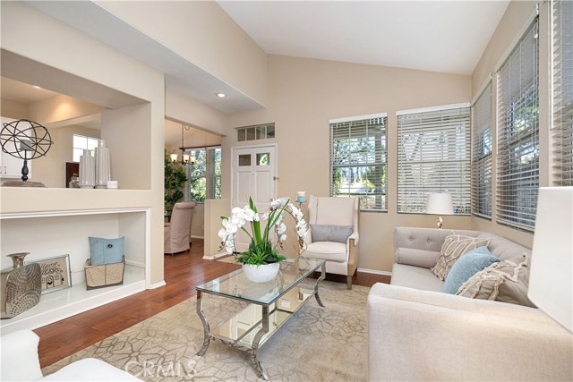 41 Paseo Vespertino Rancho Santa Margarita, California Location Location Location!!! A lovely, quiet home in the private gated community of Los Paseos. A well manicured home with a white picket fence. This single family home has a bedroom and full bath downstairs. There are two addition bedrooms upstairs and full laundry unit. Upstairs master bedroom has dual sinks, separate tub and separate shower with lovely mirrored closets. Brand new carpet upstairs with hardwood floors downstairs. Bright and airy kitchen with refurbished cabinets. Downstairs vaulted ceilings. This home is very light and bright with an open floor plan and double paned windows throughout. Mountain view from the upper level of the house. Outside patio with side yard. Quiet secluded association pool and spa in addition to the Rancho Santa Margarita Association amenities which includes parks, Beach Club with swimming and boating, Lakeshore amphitheater, Jr. olympic pool with wader pool, soccer/baseball fields, lighted basketball and tennis courts. This home is walking distance to popular center with movie theater, shops, and dining.