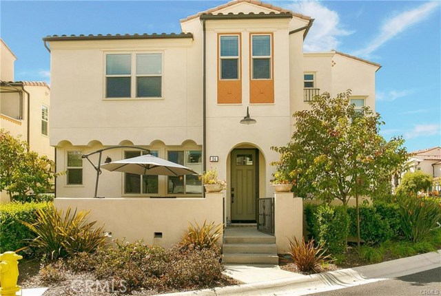 24 Hoya Street Rancho Mission Viejo, California Situated on a quaint, tree-lined street in the village of Sendero. This home's curb appeal and desirable open layout will leave a lasting impression. A charming front patio draws you into the main entry. The open floor plan offers generous outdoor and indoor living space; perfect for intimate dinner parties or large family gatherings. Features include tall ceilings, a chef-inspired kitchen complete with energy star stainless steel appliances, and a large island overlooking the living area. William Lyon's "Evolve Room" located on the second floor landing area could be utilized as a home office or temporoary school room. The luxurious master suite is the ideal place to relax and unwind after a hectic day. Light and bright best describes this home with great views of the hillside and the Sendero neighborhood. Rancho Mission Viejo provides amenities including multiple pools, parks, hiking trails, clubhouses, fitness centers/gyms, BBQ area, fire pits, community gardens, and a award winning schools.