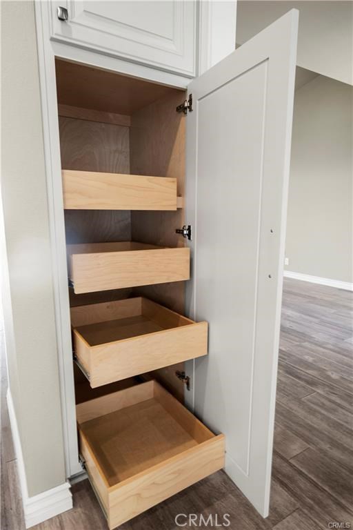 Thoughtfully designed cabinetry includes soft-close drawers & cabinets, and pull-out drawers in the pantry which make reaching for those hard-to-get items in the back a cinch!
